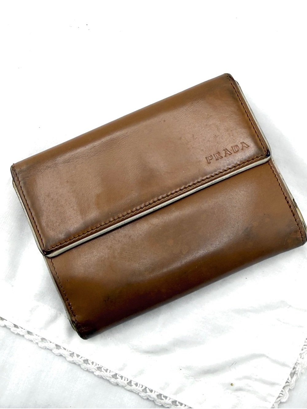 Authentic Prada wallet. Tan.